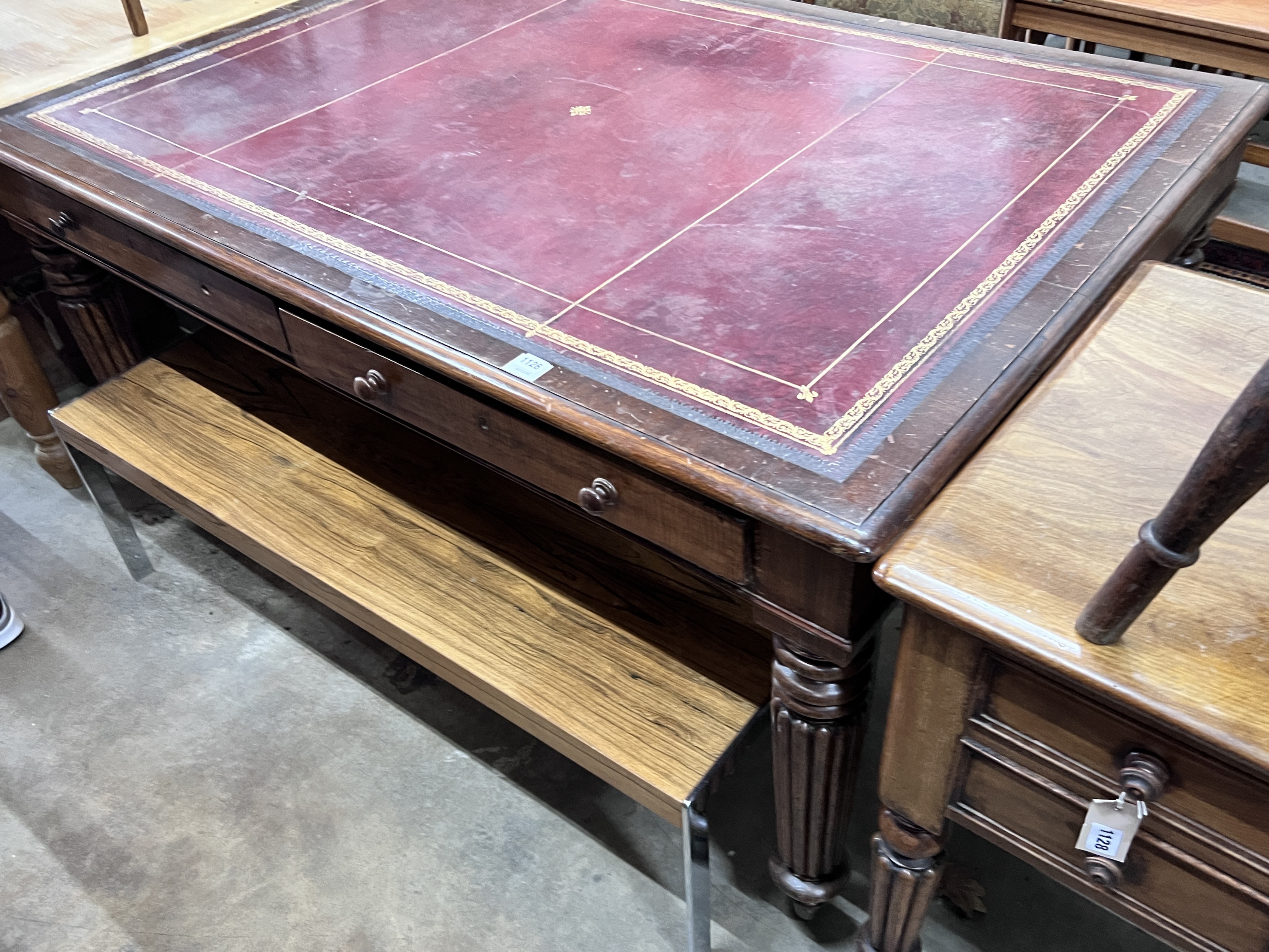 A mid Victorian mahogany partner’s writing table, width 156cm, depth 109cm, height 76cm